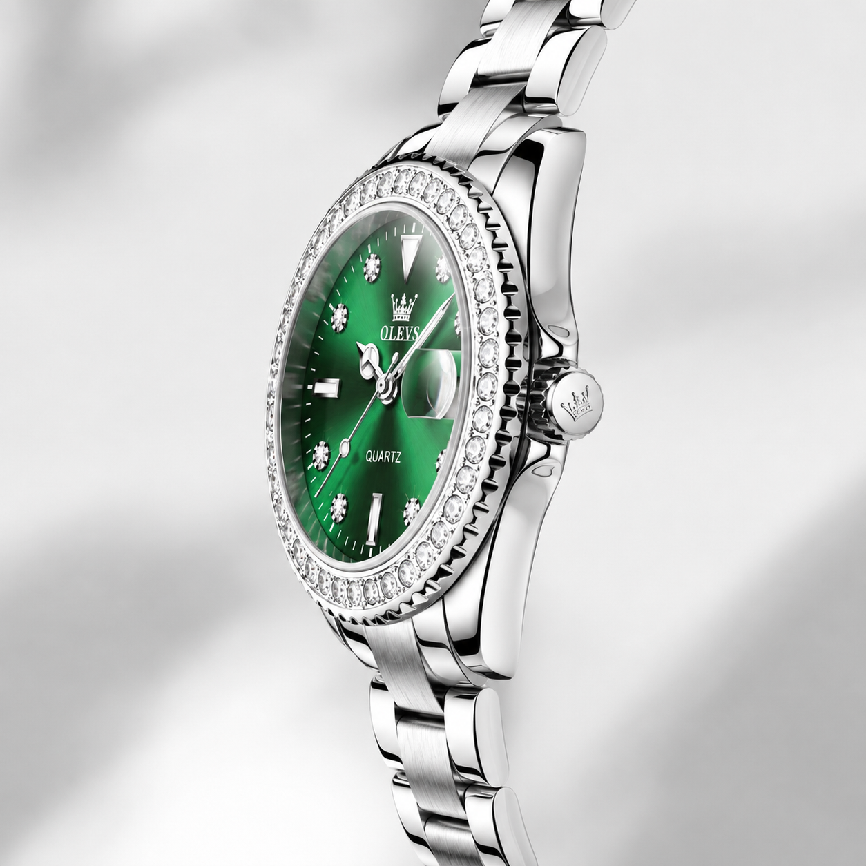 OLEVS Luxury Women’s Quartz Watch with Crystal Bezel. Jovera Joyce