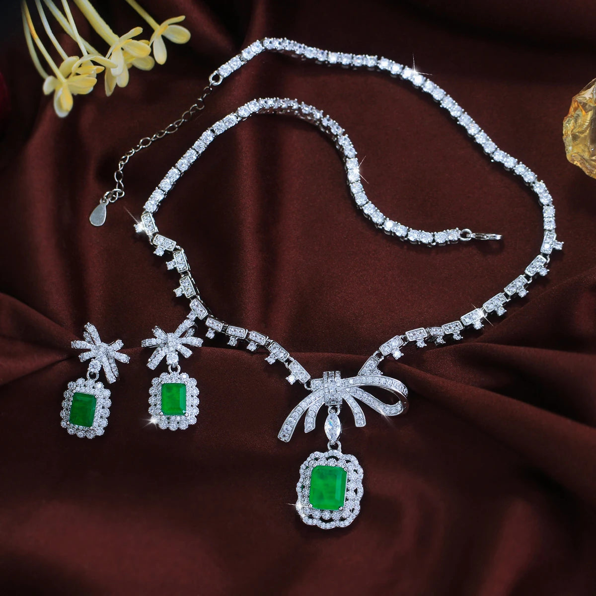 Vibrant Rhodium Plated Bow-Knot Emerald Baguette CZ Jewelry Set Green Paraiba and Zircon Necklace Earrings Wedding Jewelry Set Jovera Joyce