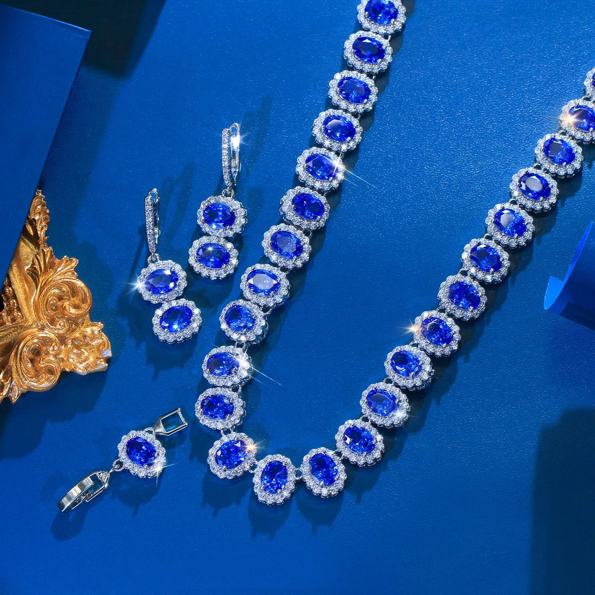 Tanzanite Oval CZ Jewelry Set Necklace Huggie Dangle Earrings Rhodium Plated Cubic Zirconia Bridal Women Wedding Jewelry Set Jovera Joyce