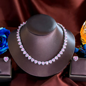 Trendy Jewelry Brass Silver Plated Jewelry Set Pink Iced CZ Ring Earrings Necklace Cuban Tennis Heart Shaped Woman Jewelry Set Jovera Joyce