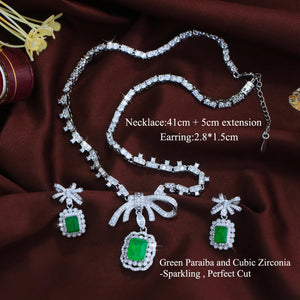 Vibrant Rhodium Plated Bow-Knot Emerald Baguette CZ Jewelry Set Green Paraiba and Zircon Necklace Earrings Wedding Jewelry Set Jovera Joyce