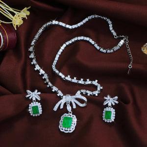 Vibrant Rhodium Plated Bow-Knot Emerald Baguette CZ Jewelry Set Green Paraiba and Zircon Necklace Earrings Wedding Jewelry Set Jovera Joyce