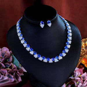 Luxury Unique Shiny Blue Synthetic Tanzanite Stone and White Zirconia Triangle Shape Bridal Wedding Party Jewelry Set for Women Jovera Joyce